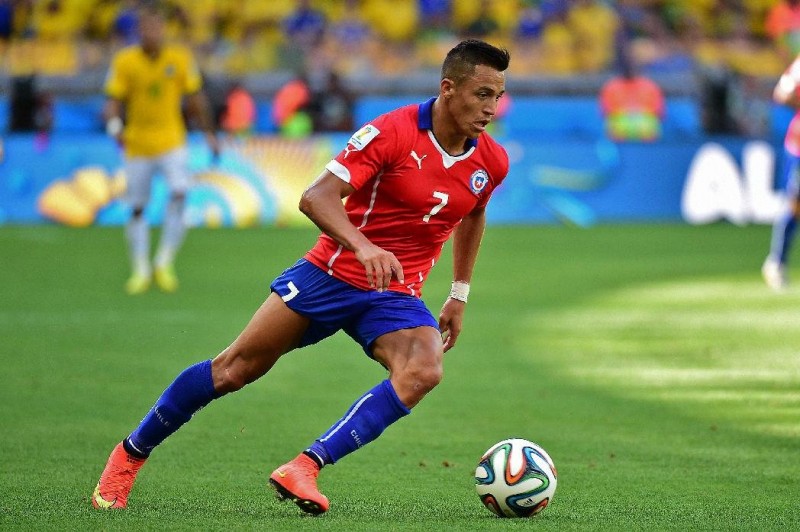 Alexis Sanchez playing for Chile in the 2014 FIFA World Cup