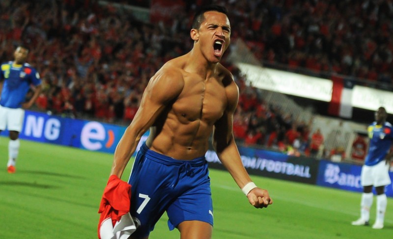 Alexis Sanchez shirtless, showing off his abs