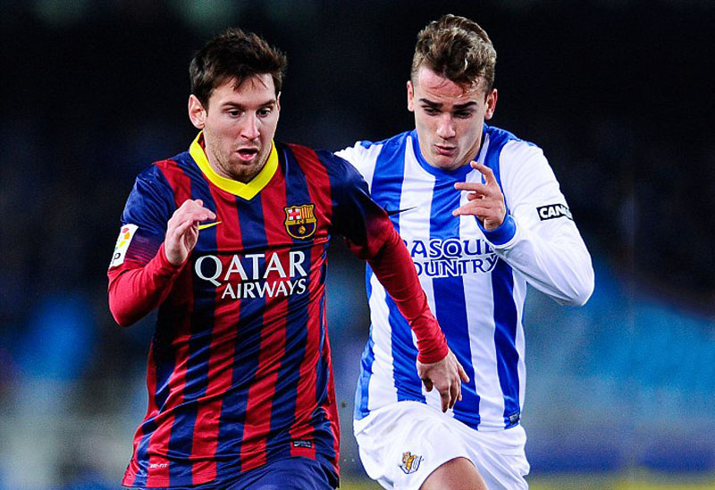 Griezmann chasing Lionel Messi