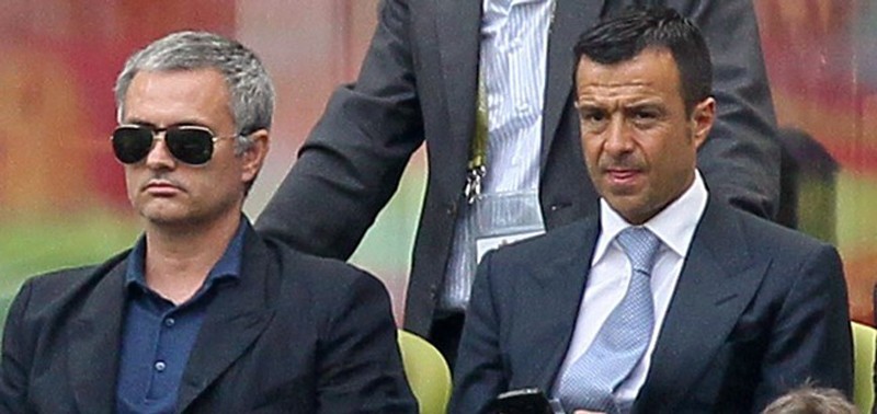 José Mourinho sitting next to Jorge Mendes
