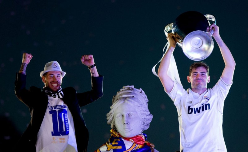 Casillas and Sergio Ramos lifting the Champions League trophy in the Cibeles, Madrid