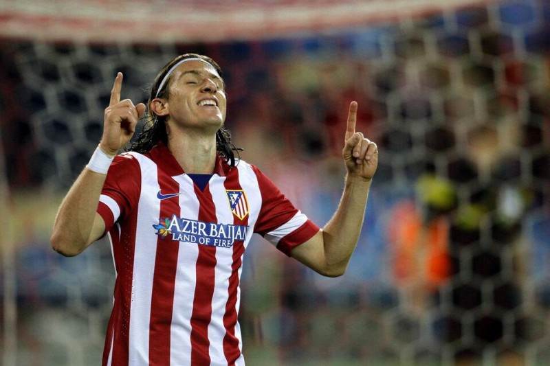 Filipe Luis celebrating goal by pointing his fingers to the sky