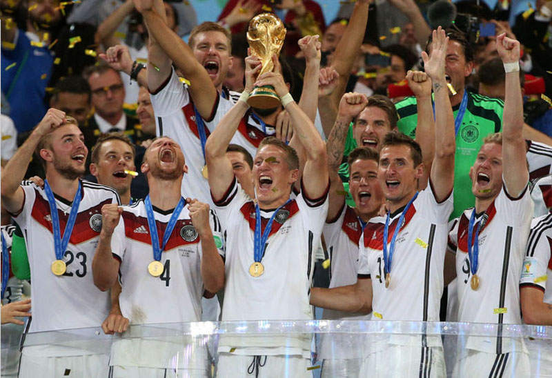 Germany players holding the FIFA World Cup trophy in 2014