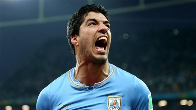Luis Suarez vampire threatening look with Uruguay