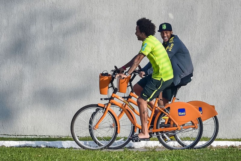 Marcelo and Neymar riding a bicycle