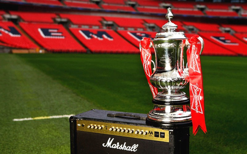 The FA Cup trophy being shown at Wembley