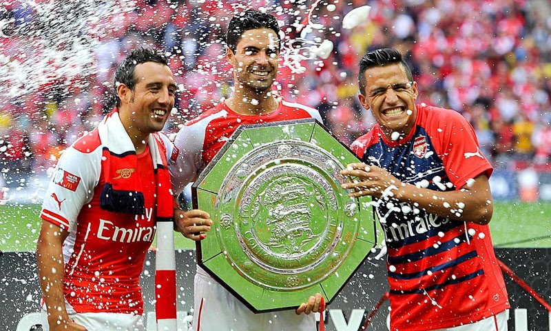 Cazorla and Alexis Sánchez winning silverware for Arsenal