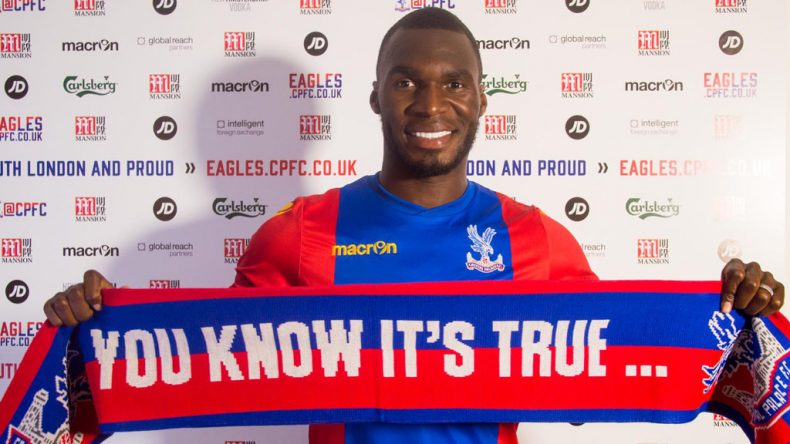 Crystal Palace's Benteke holding a you know it's true scarf