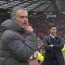 José Mourinho reacts to the cameras in front of Pochettino after Manchester United beats Tottenham in 2017