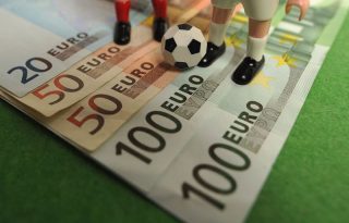 Betting money in football