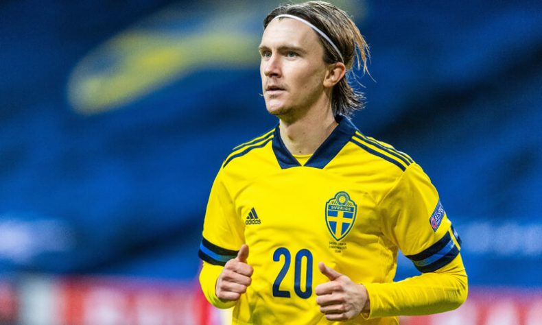 Kristoffer Olsson playing for the Swedish National Team