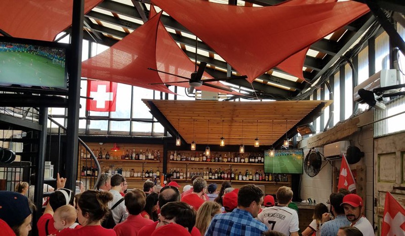 Switzerland fans watching football in a bar